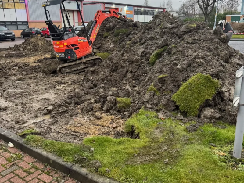 Grass area being removed in preparation for new car park