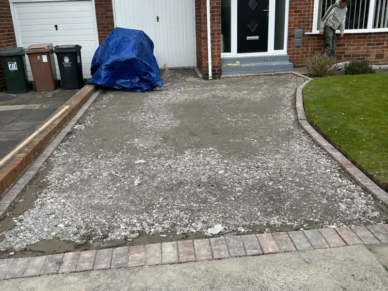 Old driveway being removed from residential property