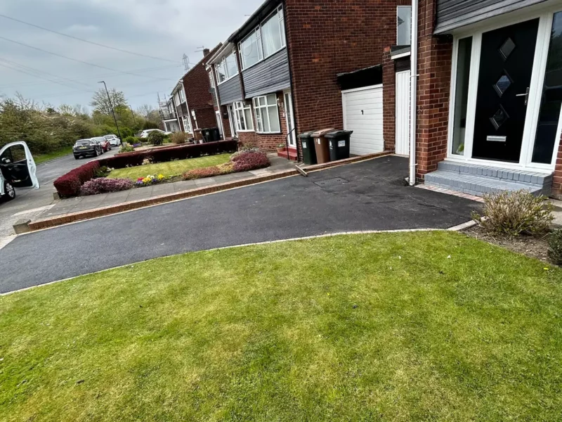 A completed Tarmac driveway in front of residential property