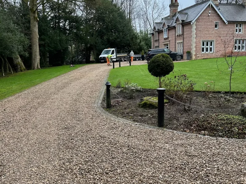 WW Contracts working on installing a large domestic gravel driveway